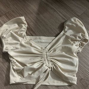 white cream puff sleeve crop top
